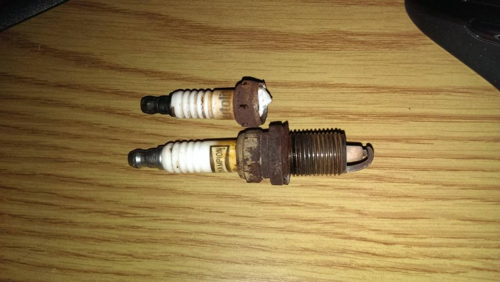 extract a broken spark plug