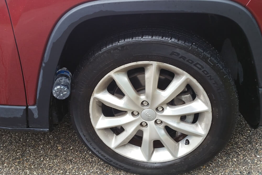 Water Bottle On Tire When Parked