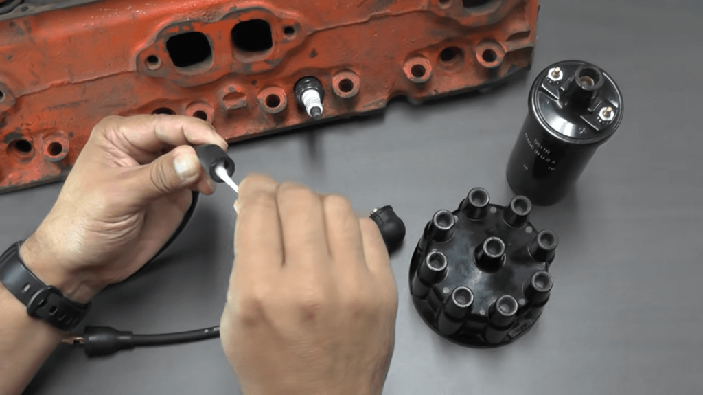 where to apply spark plug grease